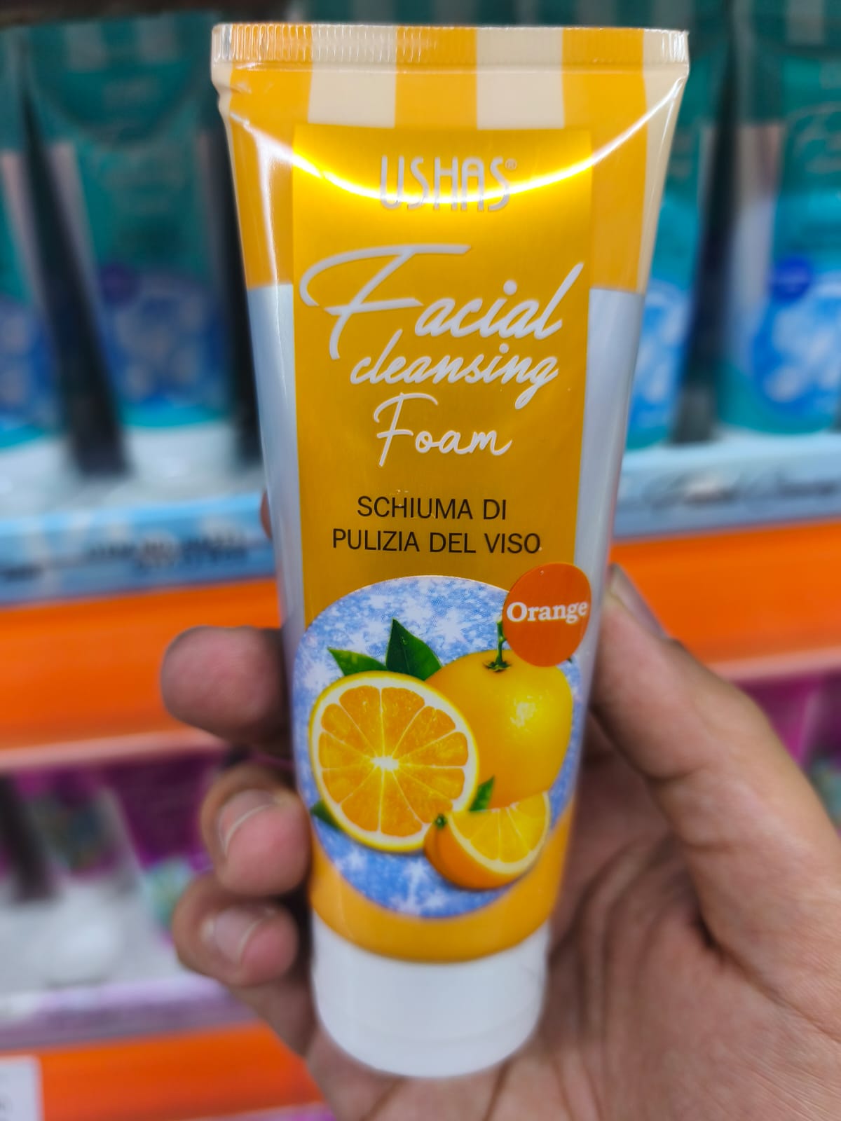 Ushas facial cleansing foam tube in orange packaging, designed to refresh and cleanse the face.
